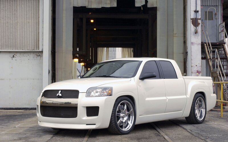 white mitsubishi pickup truck