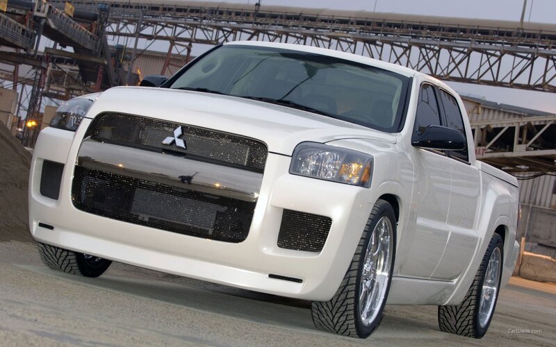 white mitsubishi pickup truck