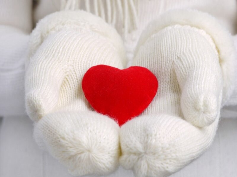 White Mittens Holding Heart