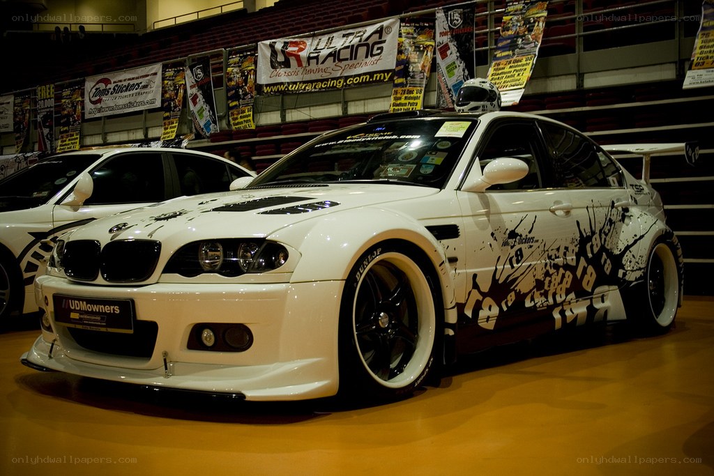 white modified bmw at car show