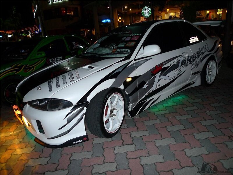 white modified car at night