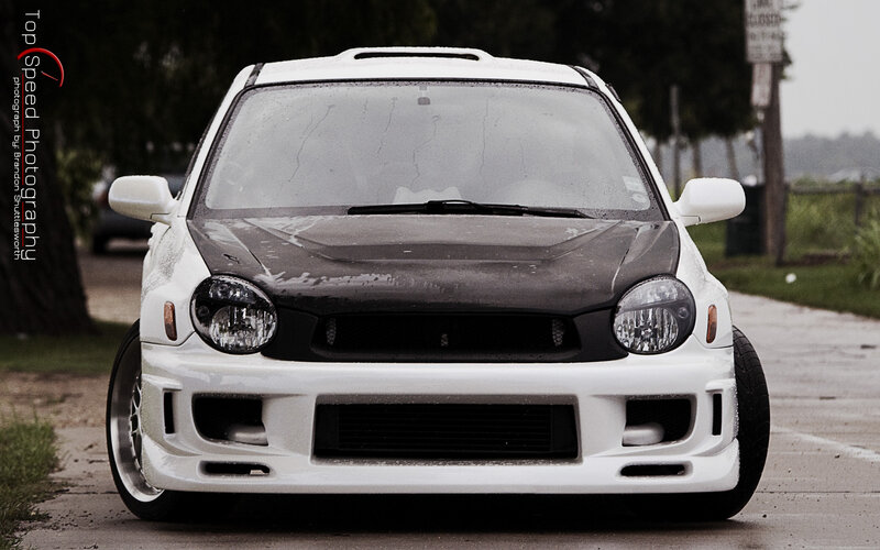 white modified car front view