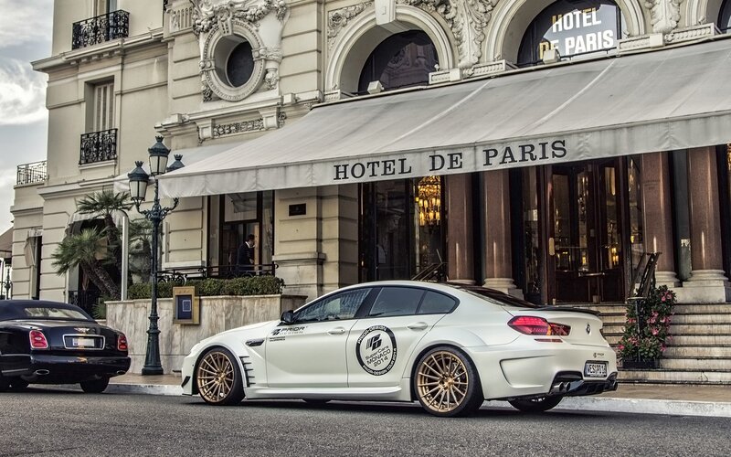 White Modified Car — Urban, Afternoon, Photograph, Hotel