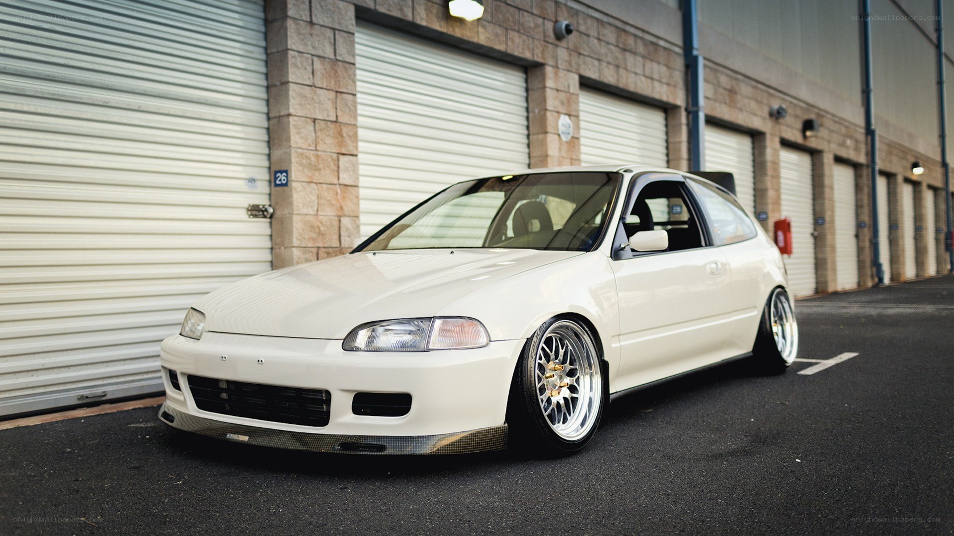 white modified hatchback car