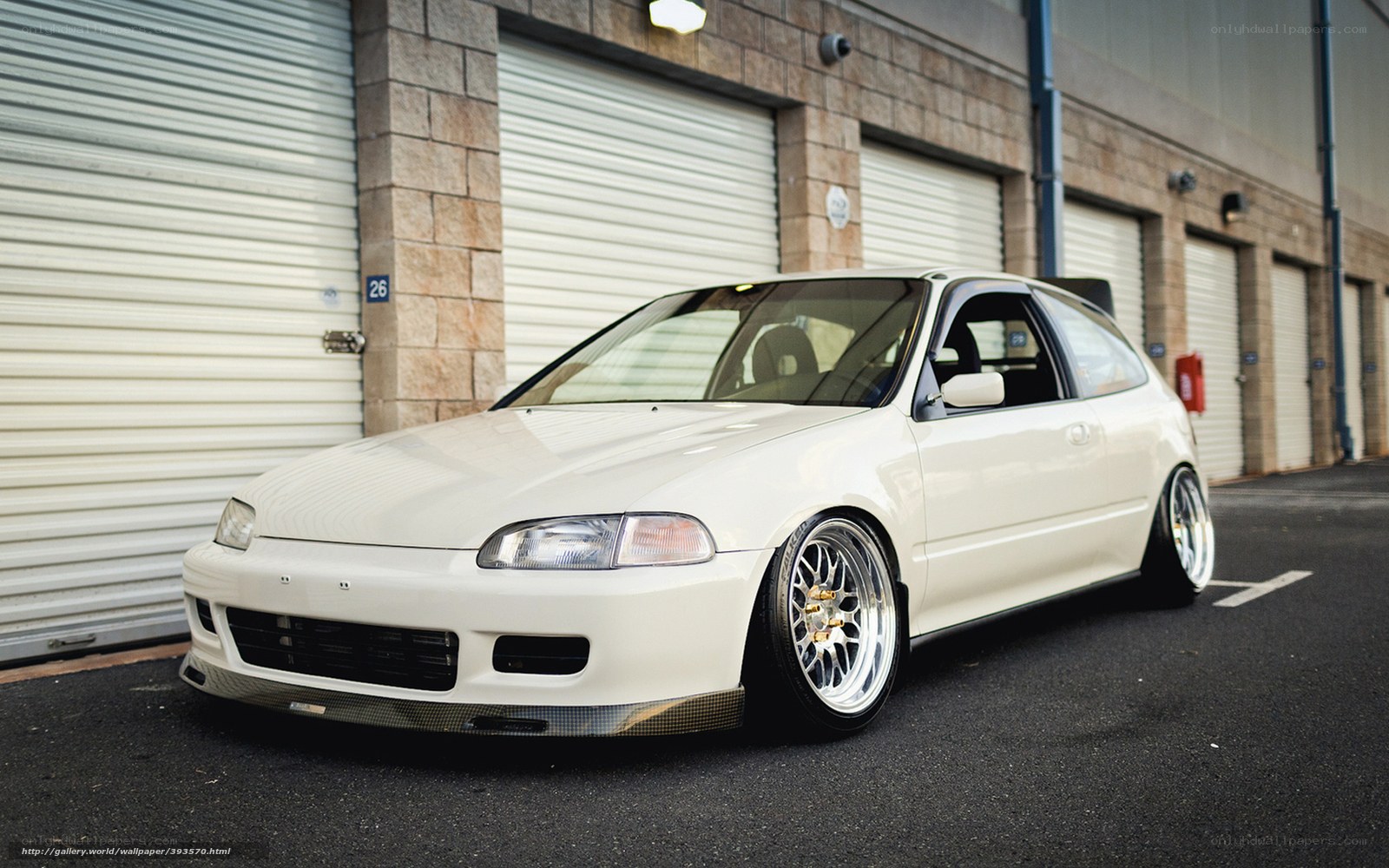 white modified hatchback car