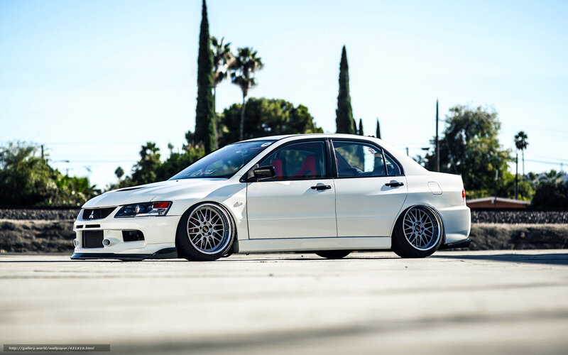 White Modified Sedan — Calm, Afternoon, Photograph