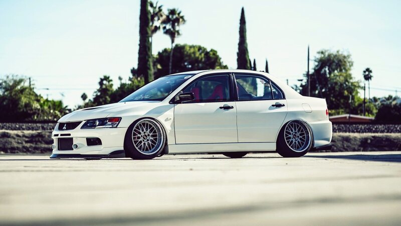 white modified sedan car
