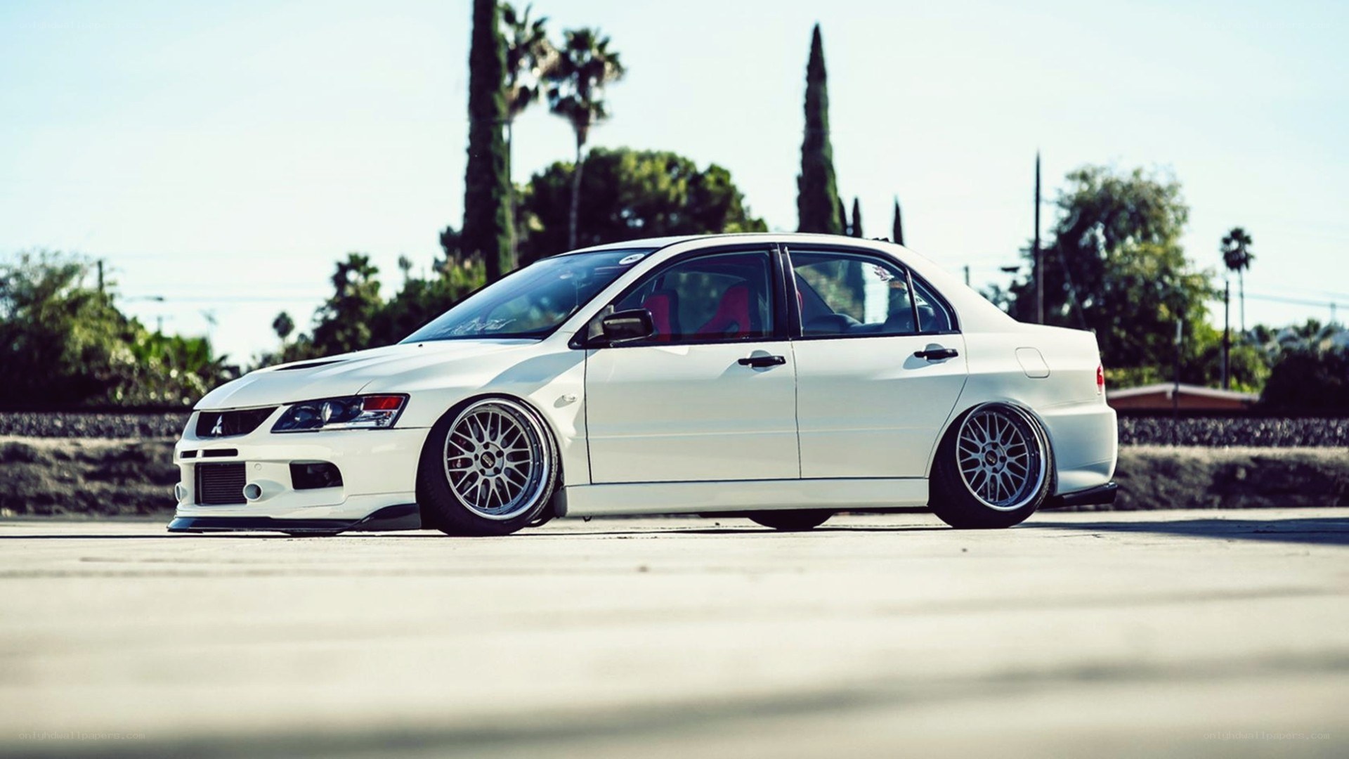 white modified sedan car