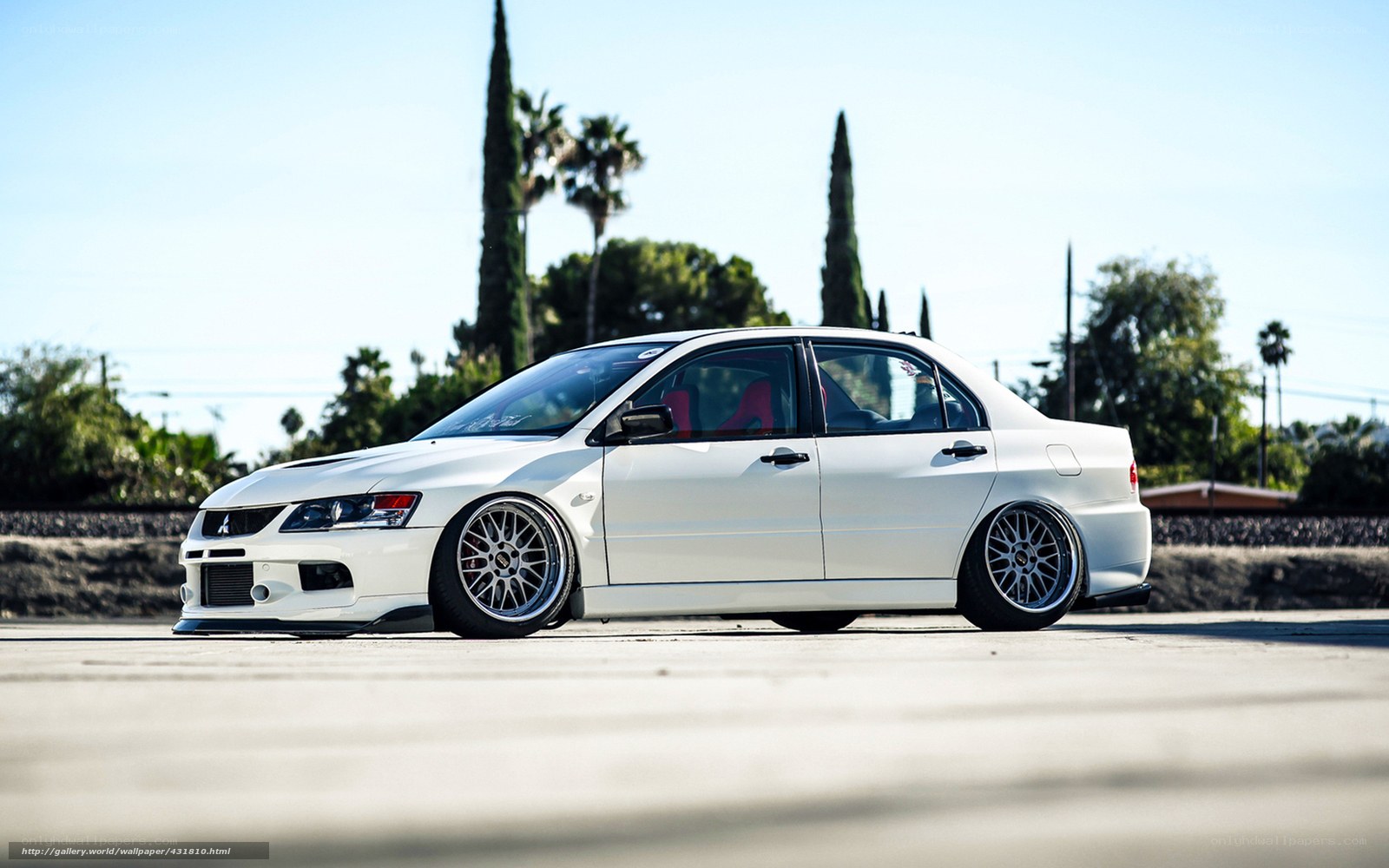white modified sedan car