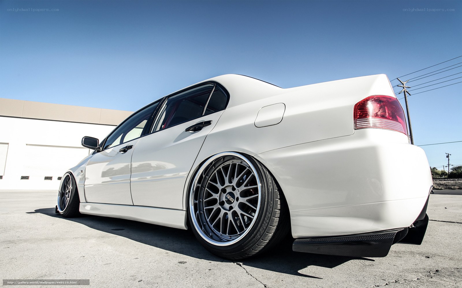 white modified sedan car