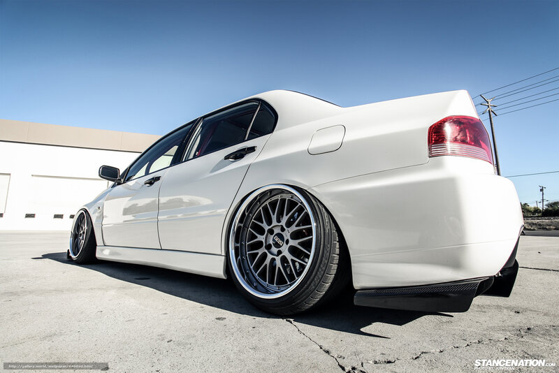 White Modified Sedan — Dramatic, Afternoon, Photograph, Car Wheel