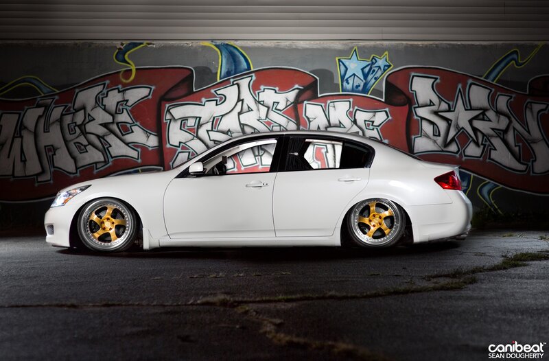 White Modified Sedan — Dramatic, Night, Photograph, Graffiti Wall