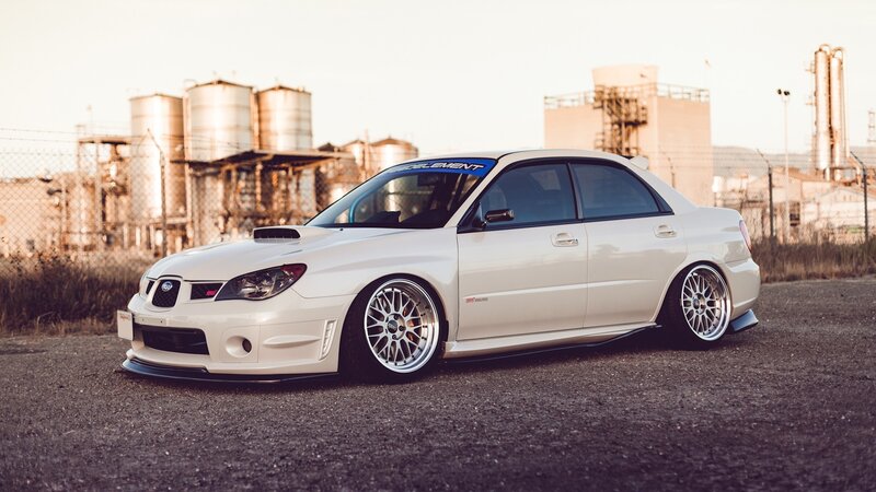 White Modified Sedan — Dramatic, Sunset, Photograph, Industrial Buildings