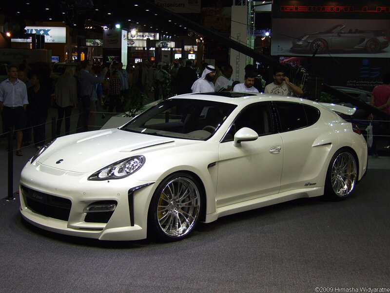 white modified sports car at show