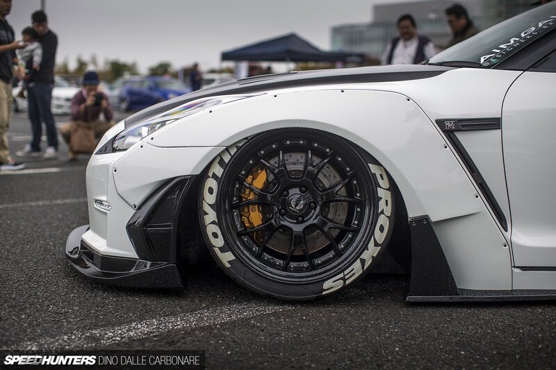 White Modified Sports Car — Calm, Afternoon, Photograph, People