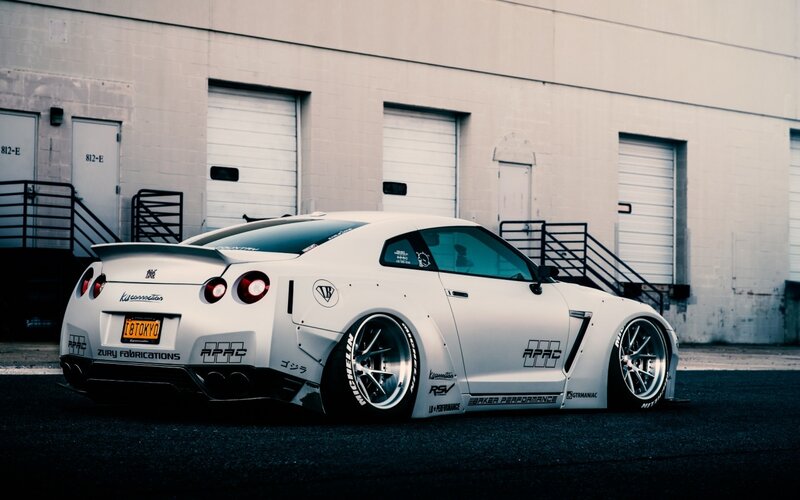White Modified Sports Car — Dramatic, Photograph, Building