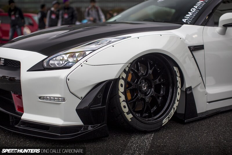 White Modified Sports Car — Dramatic, Photograph, People