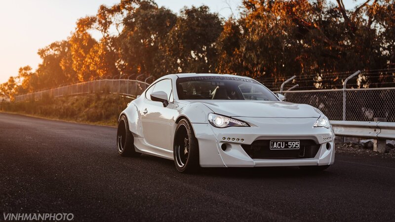 White Modified Sports Car — Dramatic, Sunset, Photograph, Road