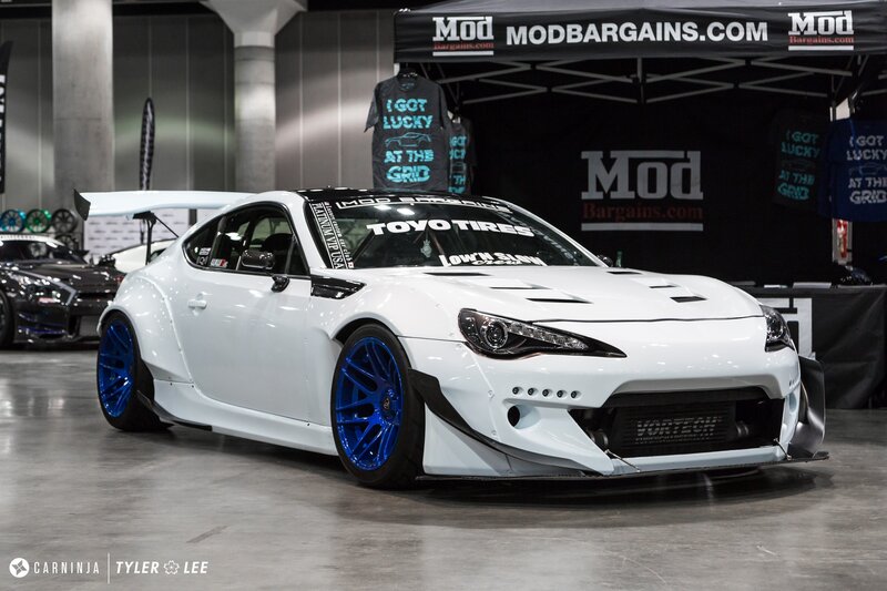 White Modified Sports Car — Showroom, Photograph, Tires