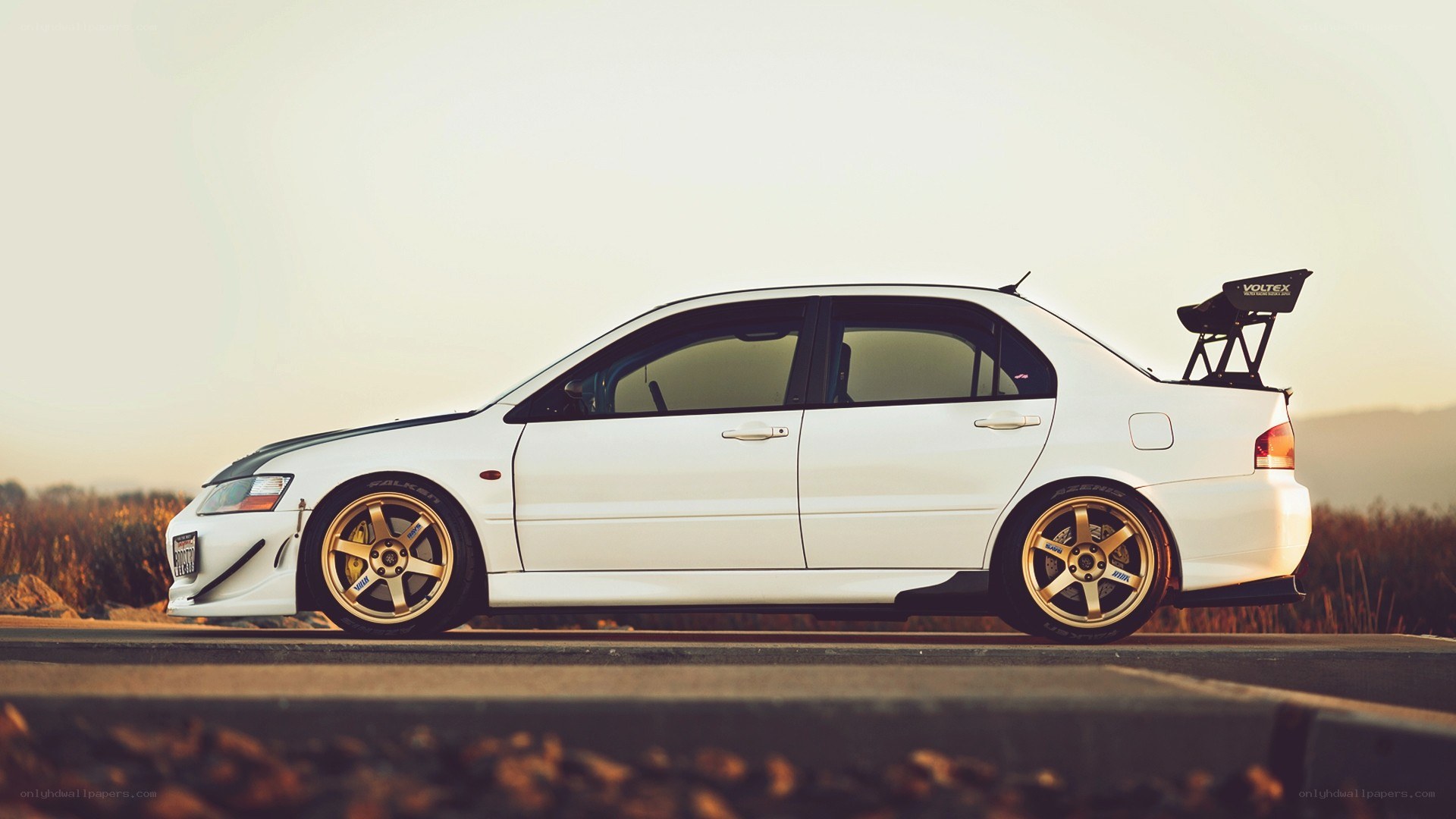 white modified sports sedan