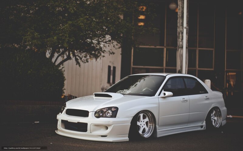 white modified subaru wrx
