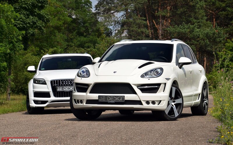 White modified SUVs on a road