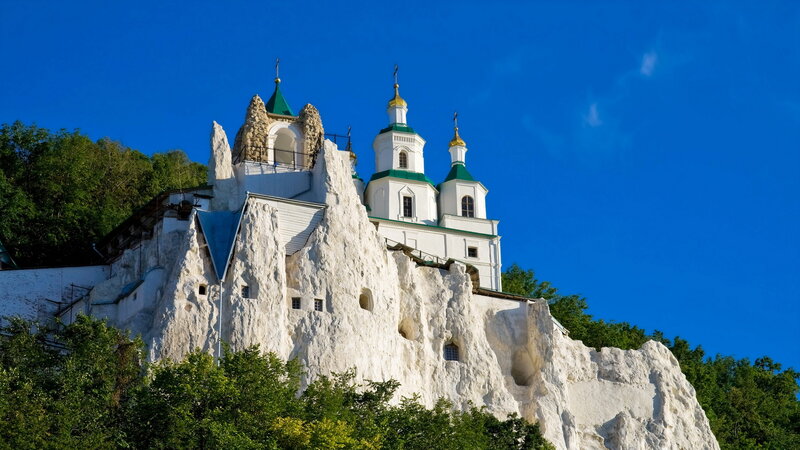 White Monastery on Cliff — Blue