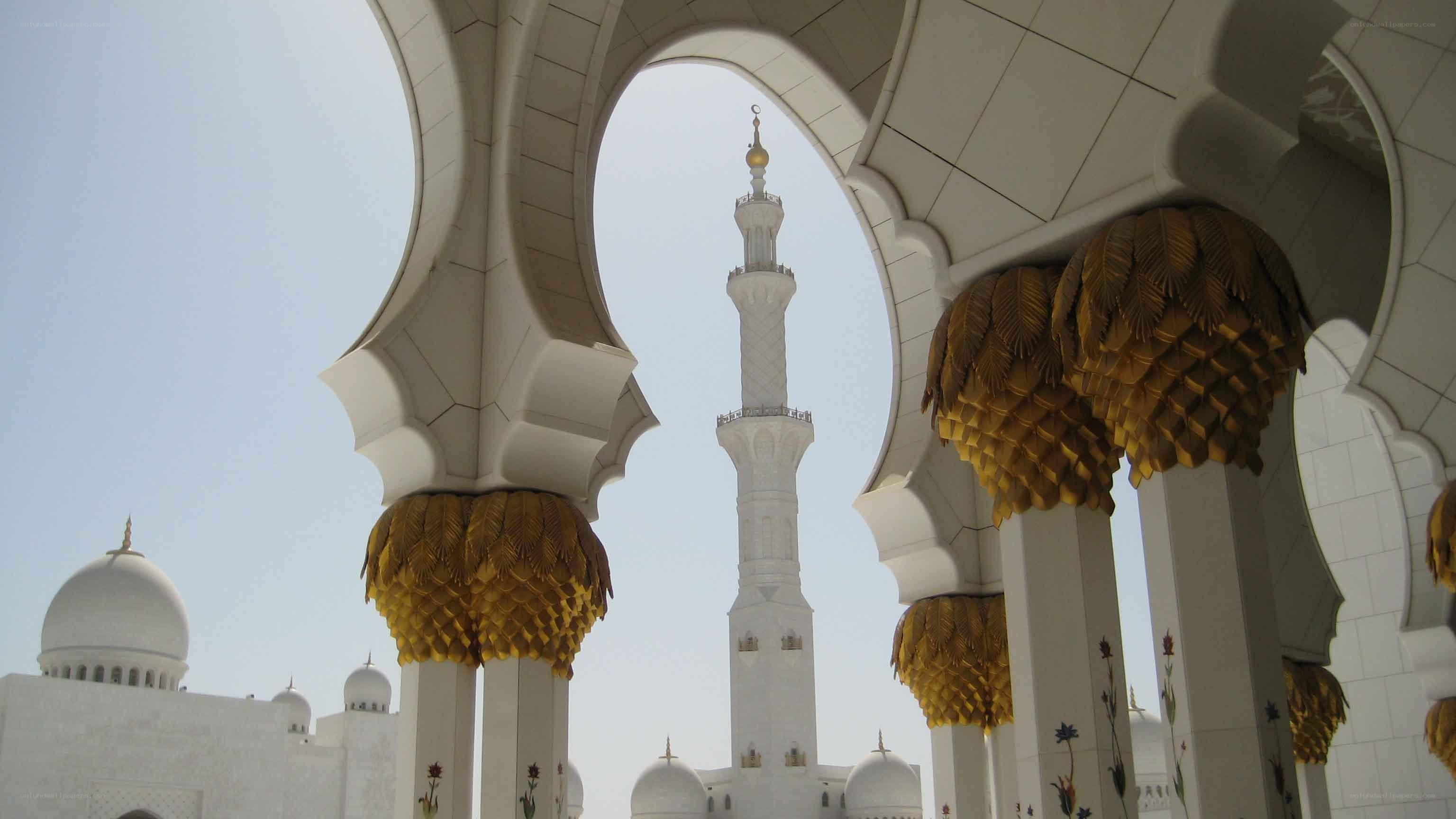 White mosque with golden details