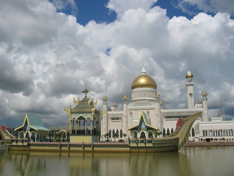 White mosque with golden dome