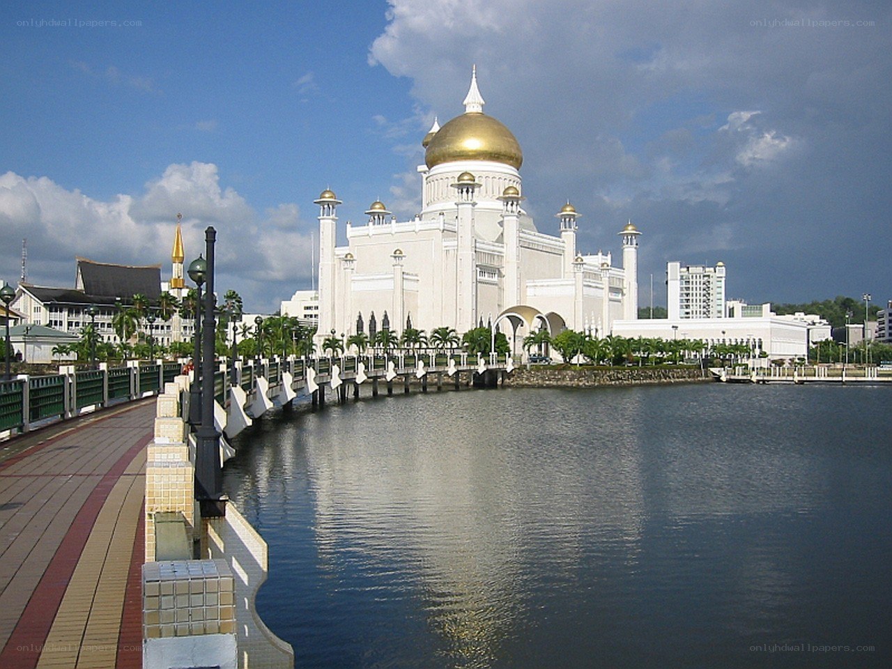 White mosque with golden dome