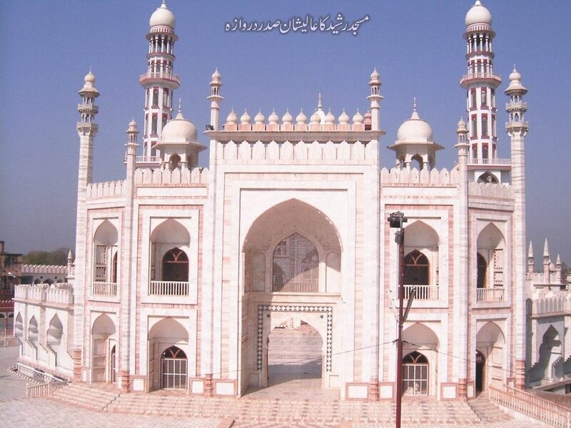 white mosque with minarets