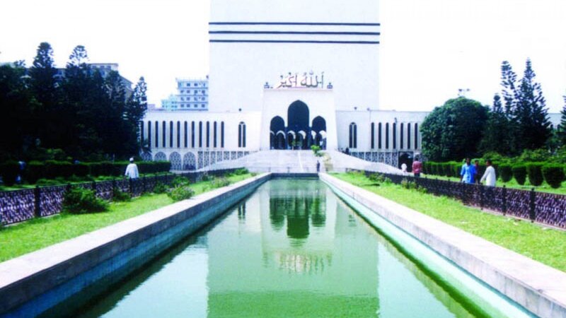 white mosque with reflecting pool