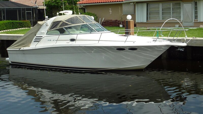 White Motorboat at Dock — Calm
