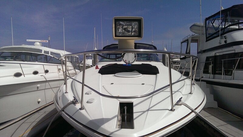 White Motorboat in Marina