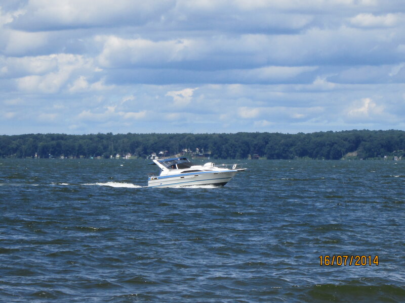White Motorboat on Water — Blue, Calm