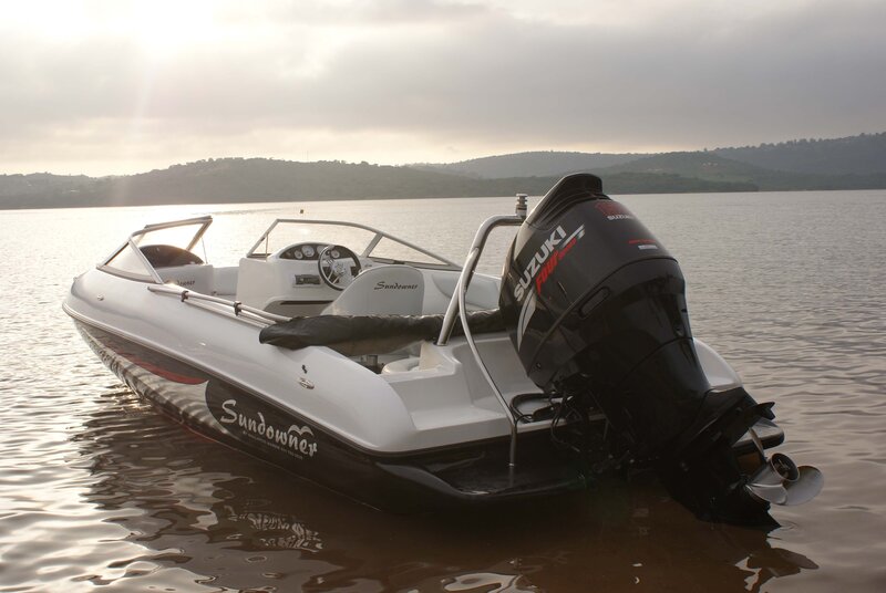 White Motorboat on Water — Serene