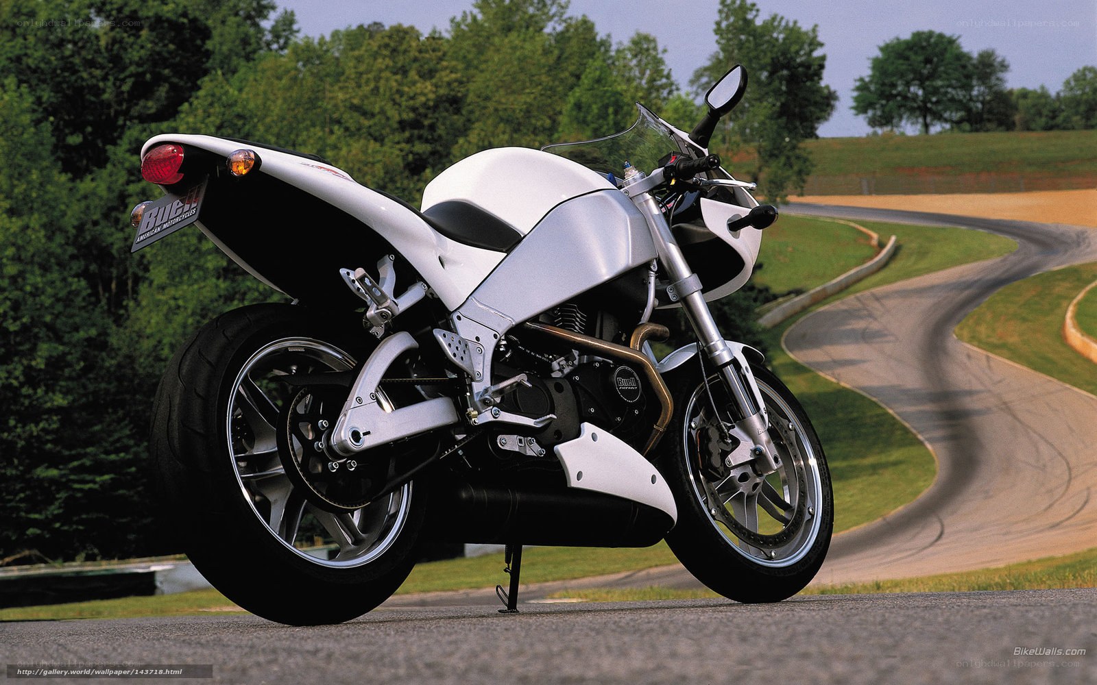 White motorcycle on a winding road