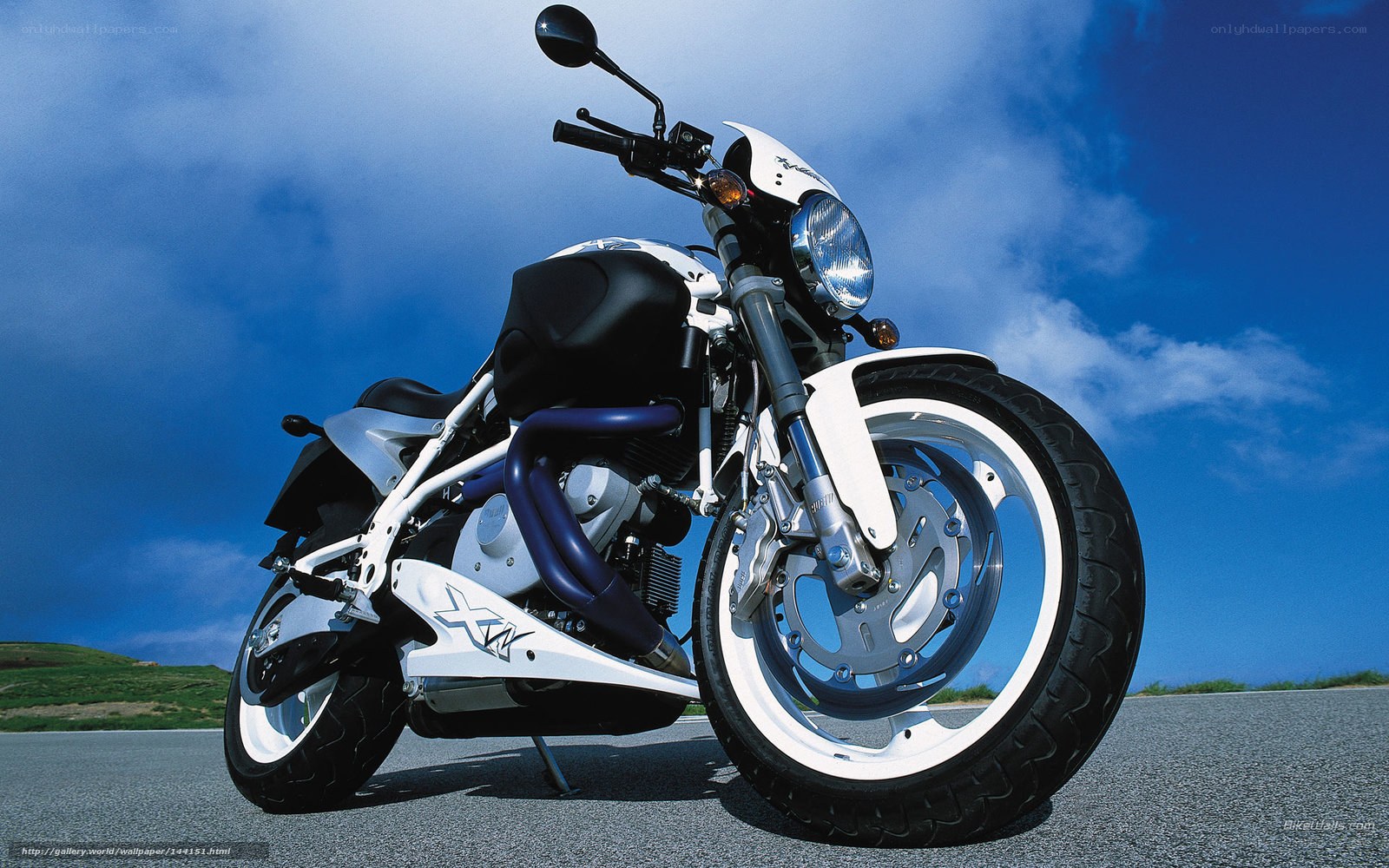 White motorcycle on asphalt
