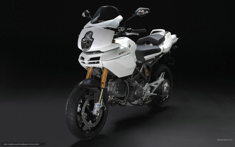 white motorcycle on black background