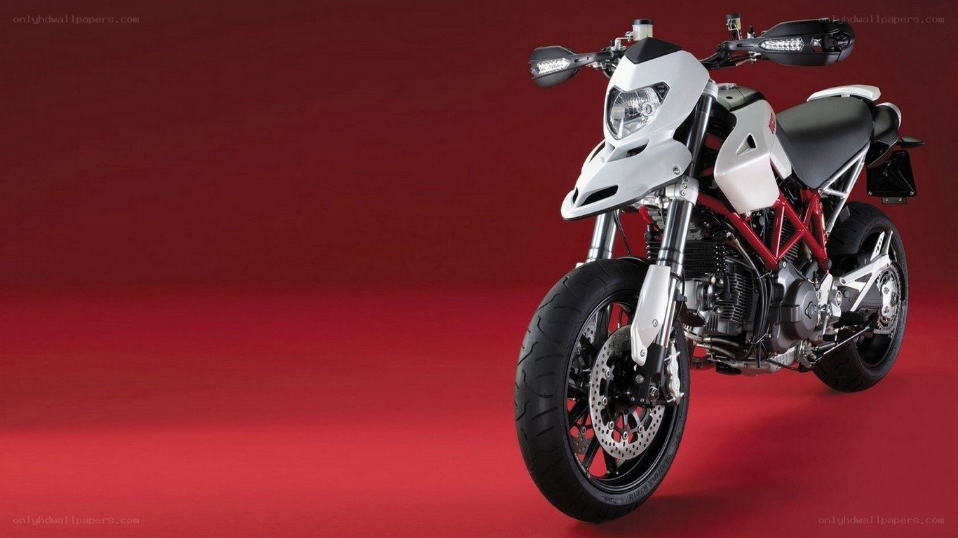 white motorcycle on red background