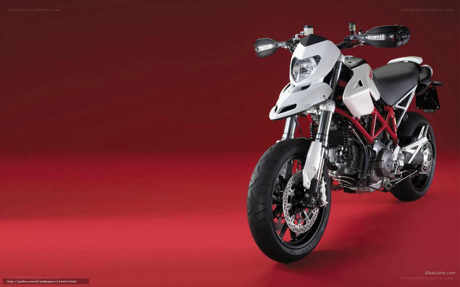 white motorcycle on red background