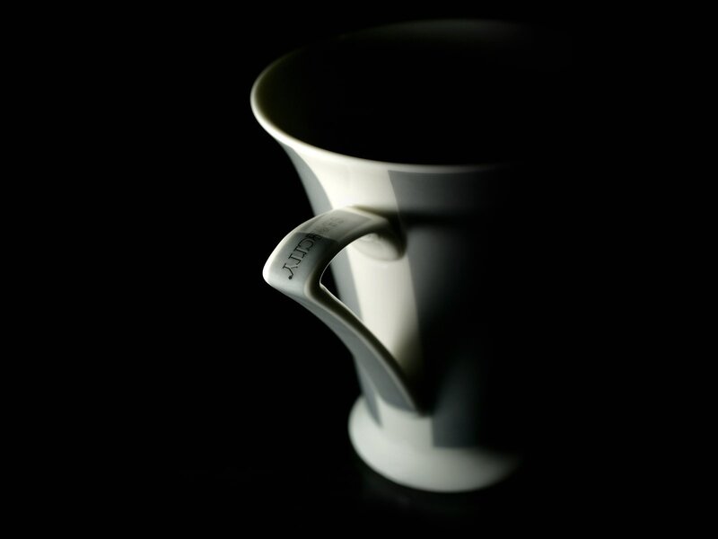 white mug on black background