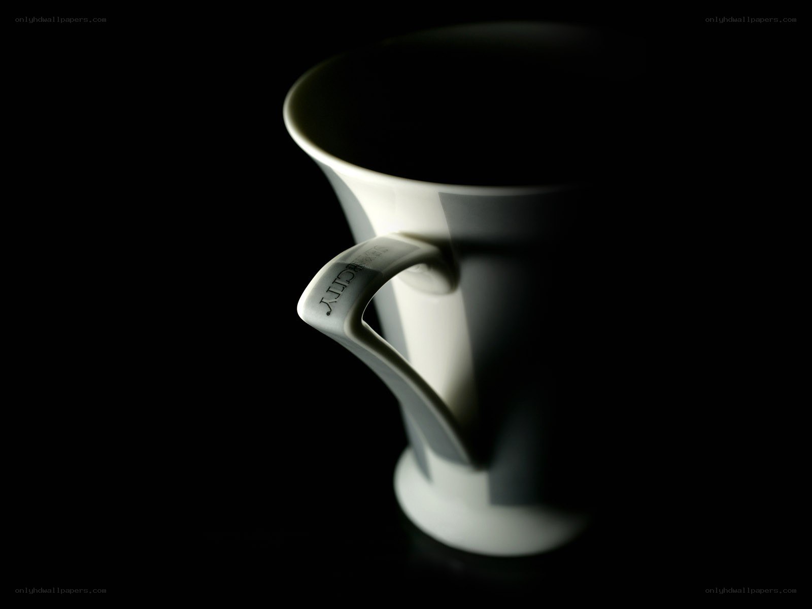 white mug on black background