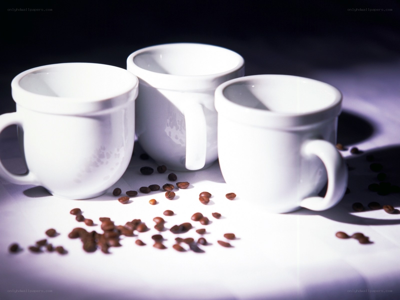 White mugs with coffee beans