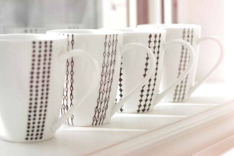 White Mugs with Patterns