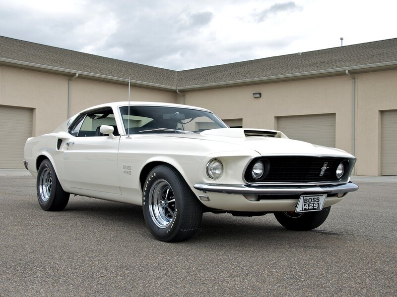 White Muscle Car — Calm, Afternoon, Photograph, Building, Garage Doors