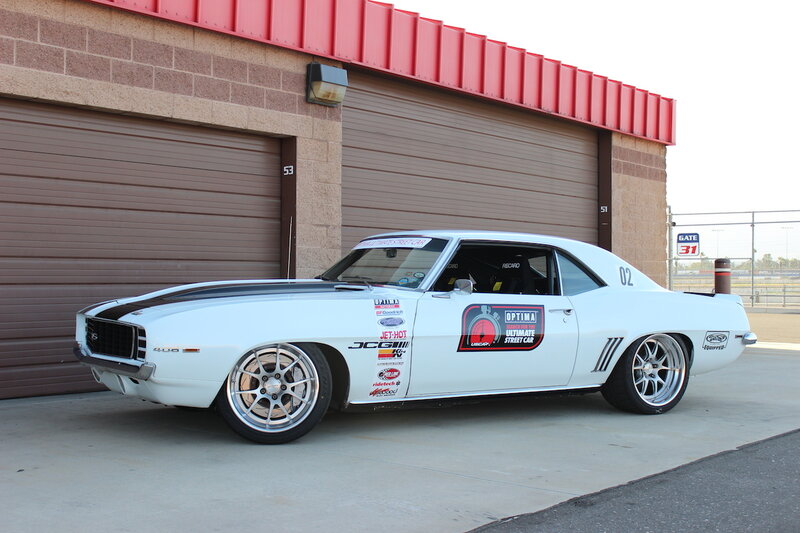 White Muscle Car — Calm, Afternoon, Photograph, Garage Doors