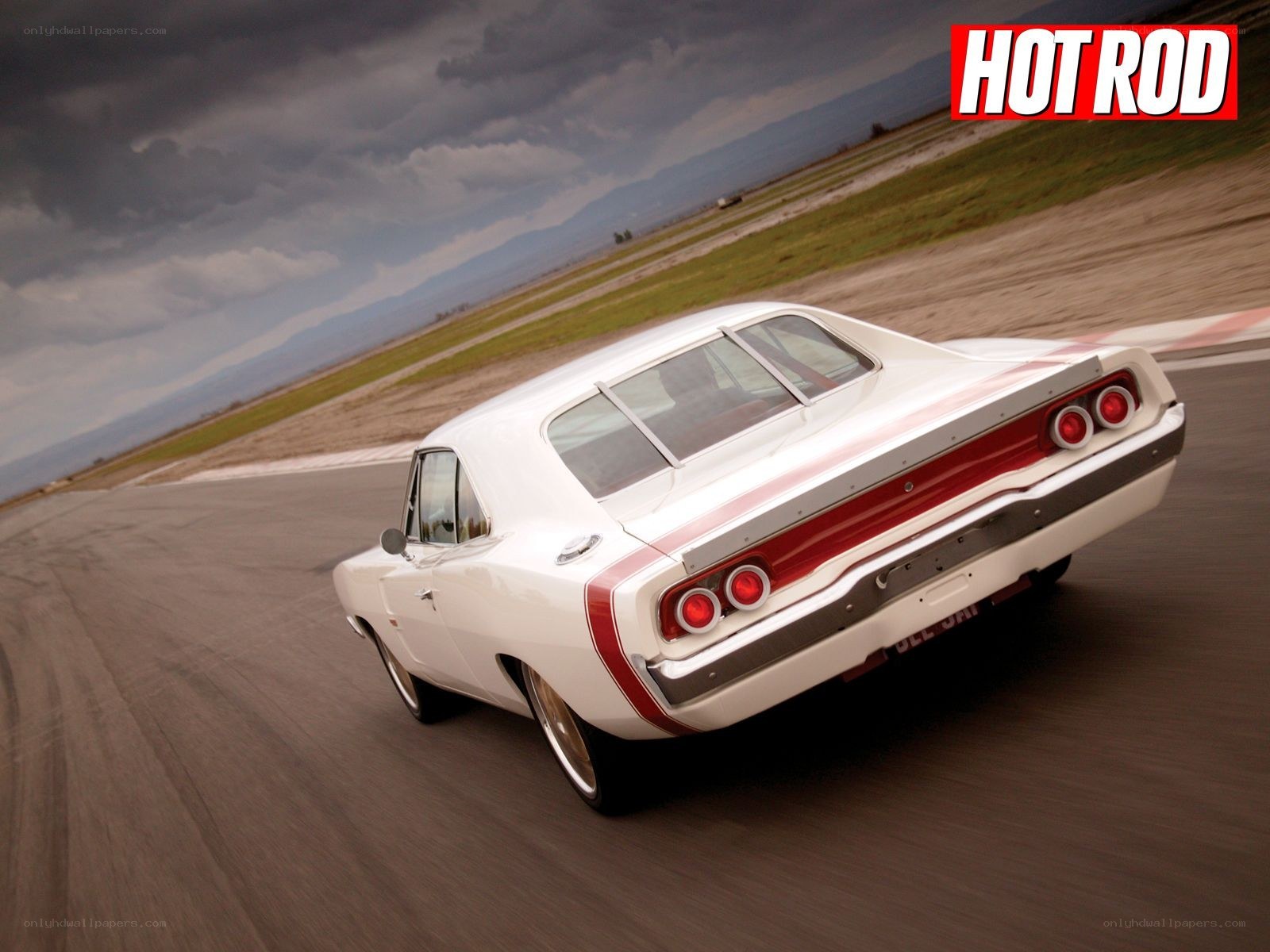 white muscle car on track