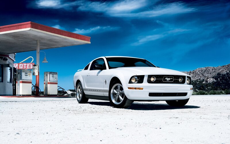 White Mustang at gas station