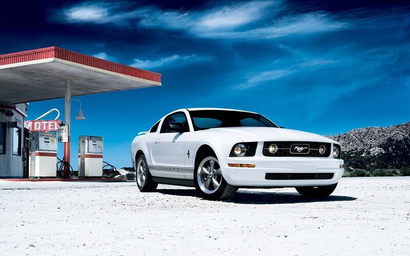 White Mustang at gas station